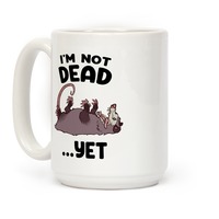 https://images.lookhuman.com/render/thumbnail/DfimxAEFupE97jWydpPxixx3kUG8LjTD/mug15oz-whi-z1-t-i-m-not-dead-yet.jpg